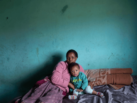 Nomakhosazana and her son, Marlon, in their home.