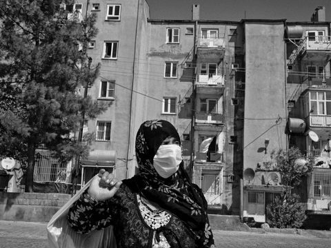 Souda, 55, stands at an intersection in the Istasyon neighbourhood of Mardin.