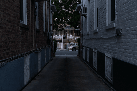 The alley leading to the road and outside world, where Elaine feared to go for months after falling ill with COVID-19.